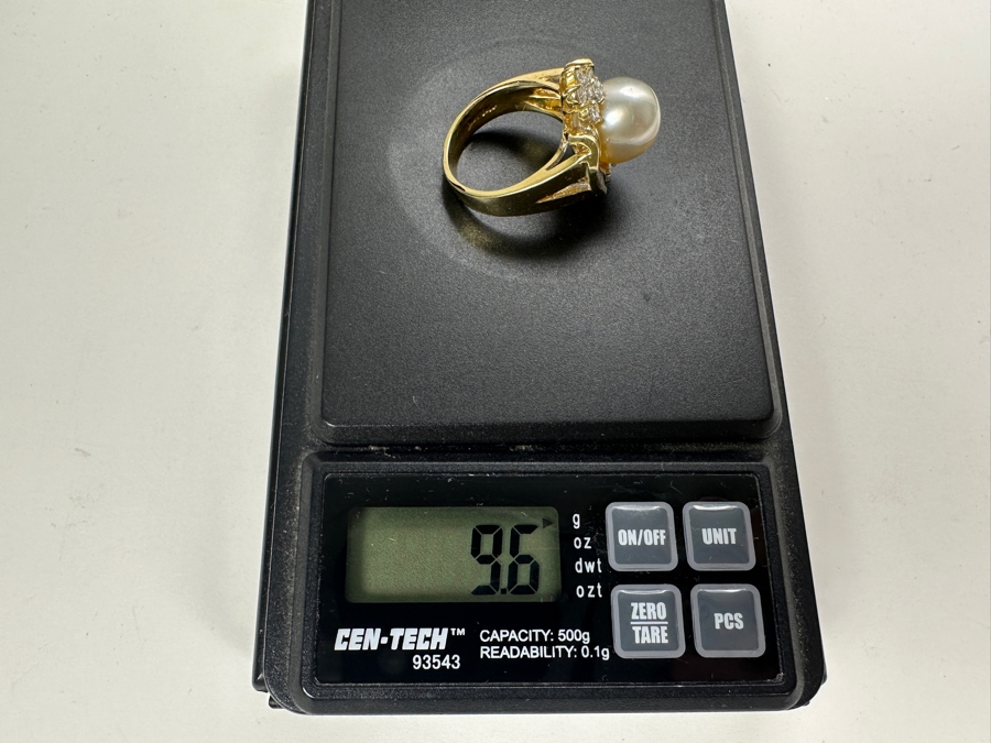 14K Gold Ring (9.6g) with 11mm Cultured Pearl, .80 cttw Round Brilliant Diamonds + .50 cttw Baguette Diamonds Size 7 Fair Market Value $1,700 Retail $3,400 [Photo 17]