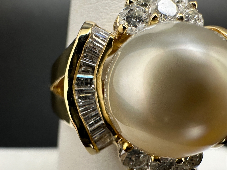 14K Gold Ring (9.6g) with 11mm Cultured Pearl, .80 cttw Round Brilliant Diamonds + .50 cttw Baguette Diamonds Size 7 Fair Market Value $1,700 Retail $3,400 [Photo 4]