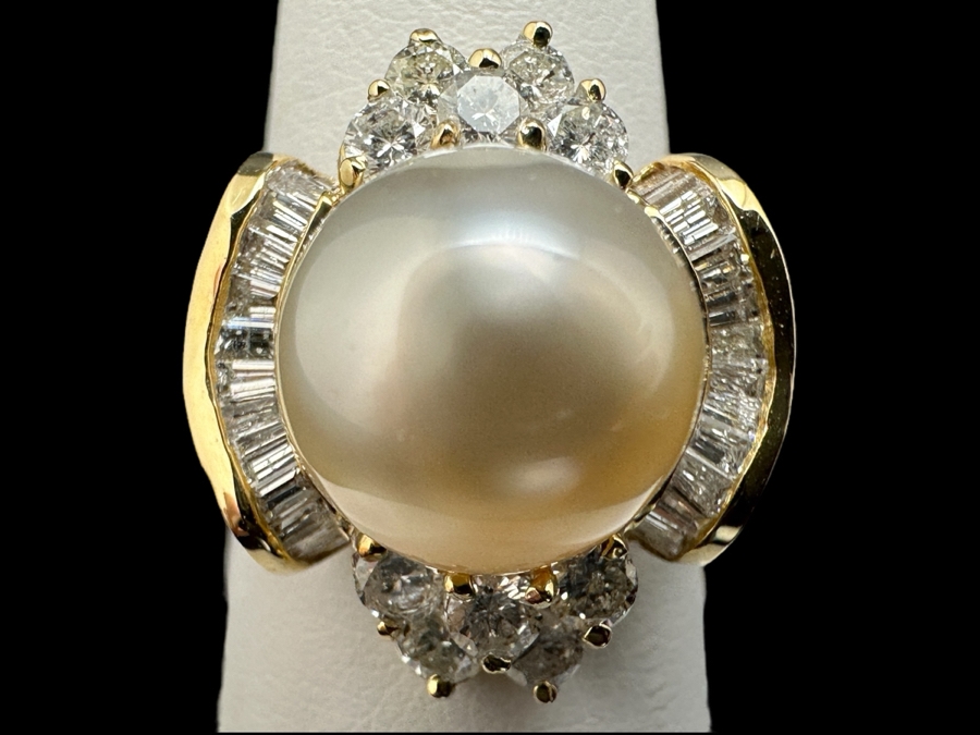 14K Gold Ring (9.6g) with 11mm Cultured Pearl, .80 cttw Round Brilliant Diamonds + .50 cttw Baguette Diamonds Size 7 Fair Market Value $1,700 Retail $3,400