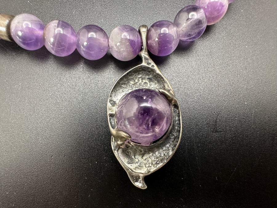 Sterling Silver & Amethyst 17' Necklace With Sterling Silver Dolphins Encasing A Rotating Amethyst Marble Pendant [Photo 3]
