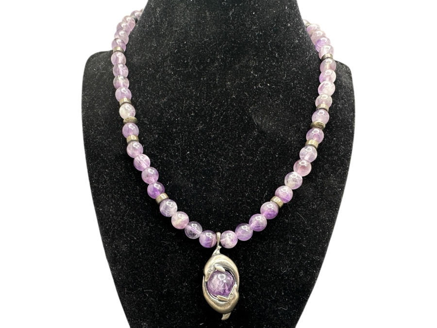 Sterling Silver & Amethyst 17' Necklace With Sterling Silver Dolphins Encasing A Rotating Amethyst Marble Pendant