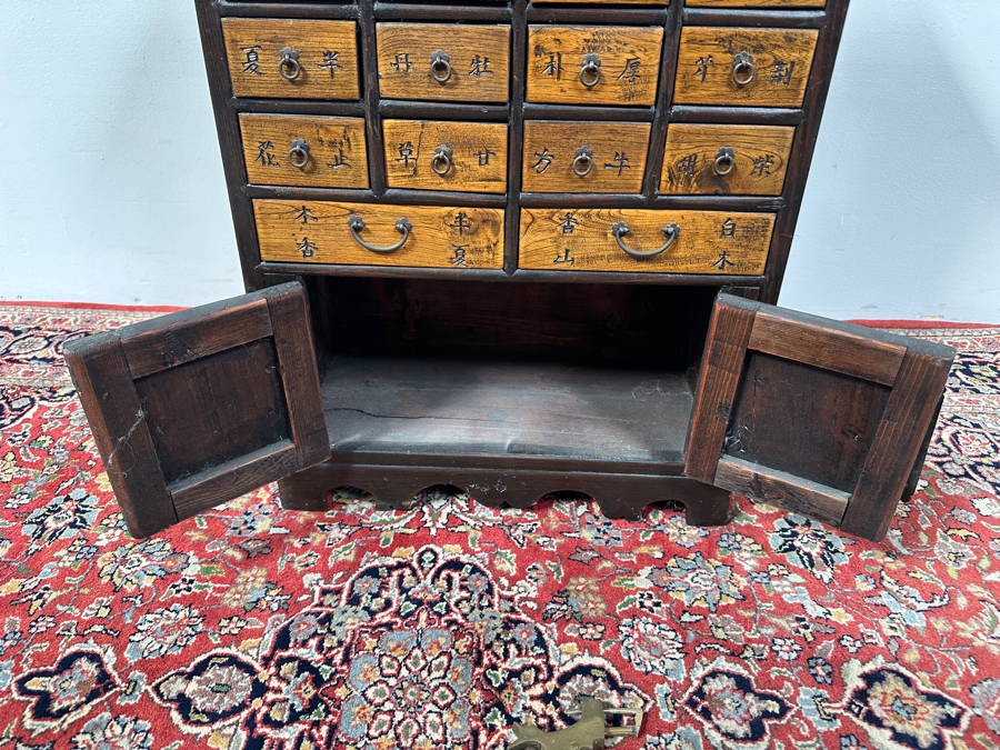 Vintage Wooden Chinese Apothecary Cabinet with Hand-Carved Detailing 19.5'W x 9'D x 27.5'H [Photo 11]