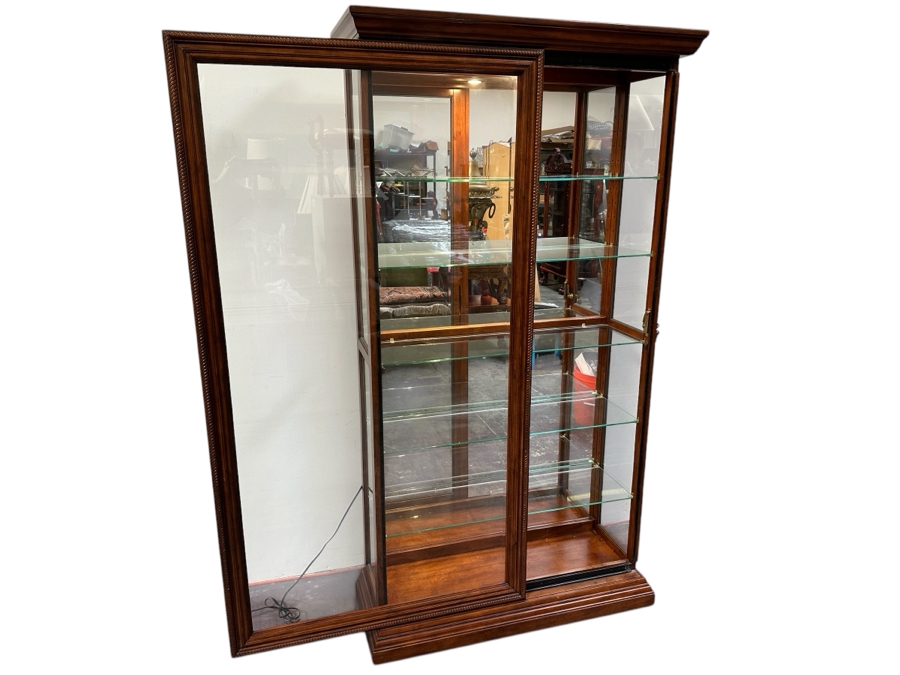 Pulaski Two Way Sliding Door Curio Cabinet 21015 with Rope-Twist Embossing and Beveled Glass 42W x 16D x 80H [Photo 1]