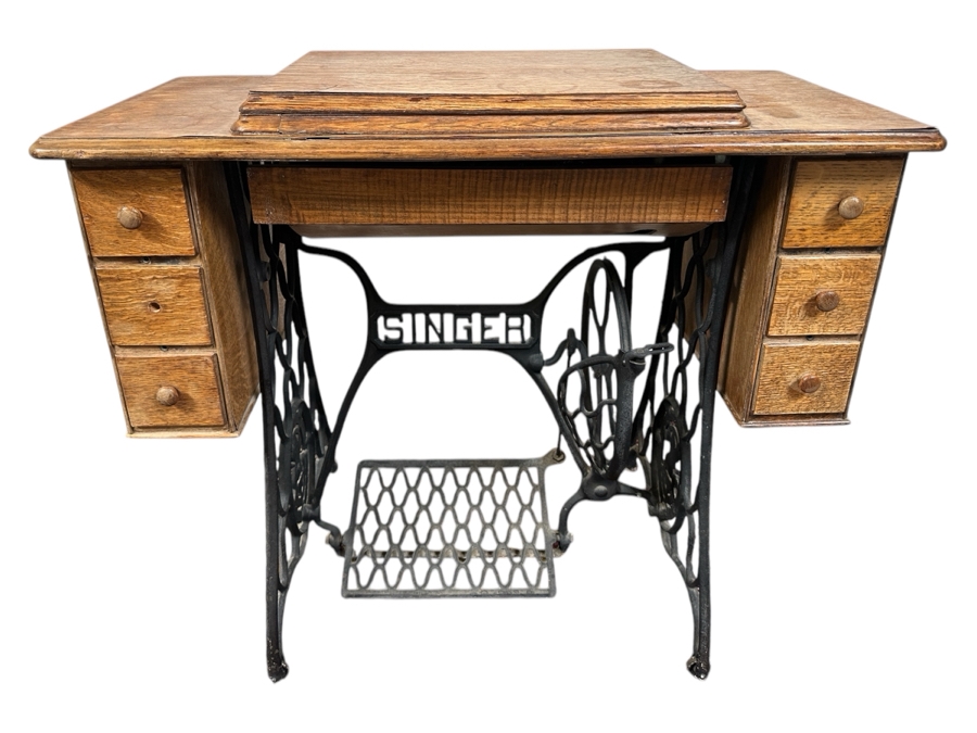 Just Added - Vintage Singer Sewing Machine with Foot Treadle in Tiger Oak Cabinet 36'W x 17'D x 31'H [Photo 1]