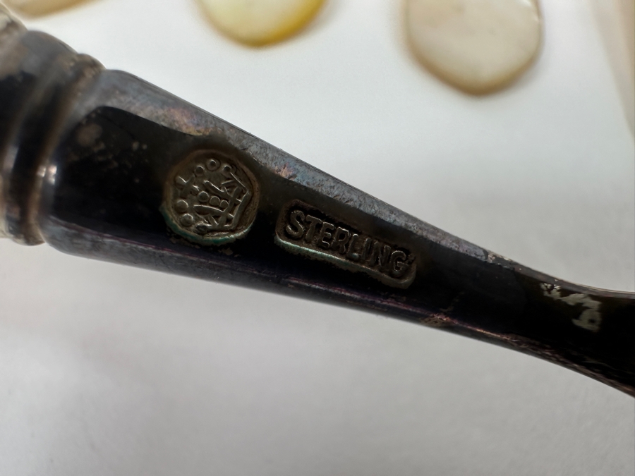 Atkinson Bros Sheffield England Flatware W/ Mother Of Pearl Handles & Sterling Silver Forks Marked With A Crown:(12) Dinner Knives, (11) Dinner Forks, (12) Small Knives, (11) Dessert Forks Approximate Silver Weight 748g Apx. Silver Melt Value $847 [Photo 10]