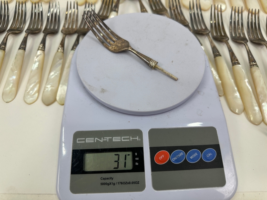 Atkinson Bros Sheffield England Flatware W/ Mother Of Pearl Handles & Sterling Silver Forks Marked With A Crown:(12) Dinner Knives, (11) Dinner Forks, (12) Small Knives, (11) Dessert Forks Approximate Silver Weight 748g Apx. Silver Melt Value $847 [Photo 12]