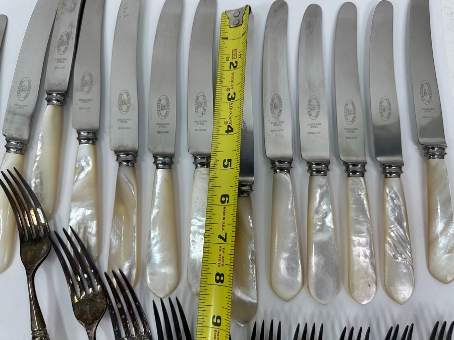 Atkinson Bros Sheffield England Flatware W/ Mother Of Pearl Handles & Sterling Silver Forks Marked With A Crown:(12) Dinner Knives, (11) Dinner Forks, (12) Small Knives, (11) Dessert Forks Approximate Silver Weight 748g Apx. Silver Melt Value $847 [Photo 16]