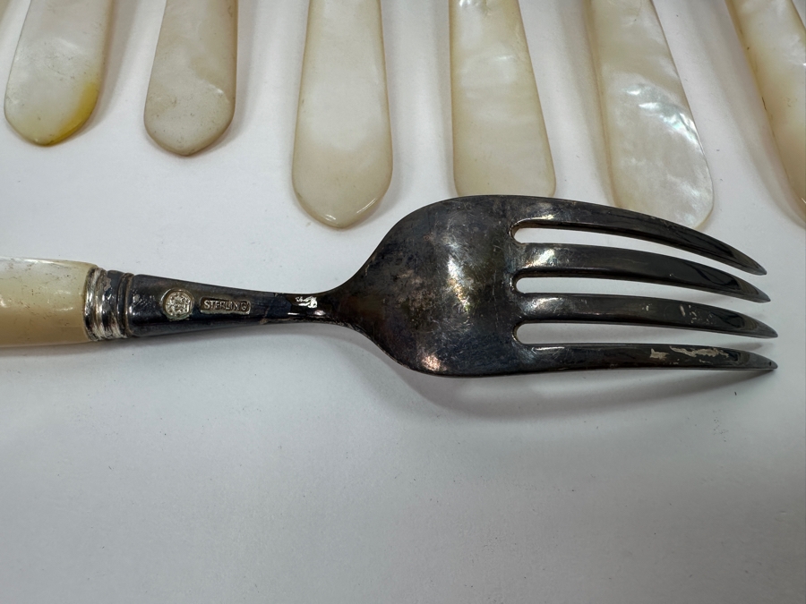 Atkinson Bros Sheffield England Flatware W/ Mother Of Pearl Handles & Sterling Silver Forks Marked With A Crown:(12) Dinner Knives, (11) Dinner Forks, (12) Small Knives, (11) Dessert Forks Approximate Silver Weight 748g Apx. Silver Melt Value $847 [Photo 7]