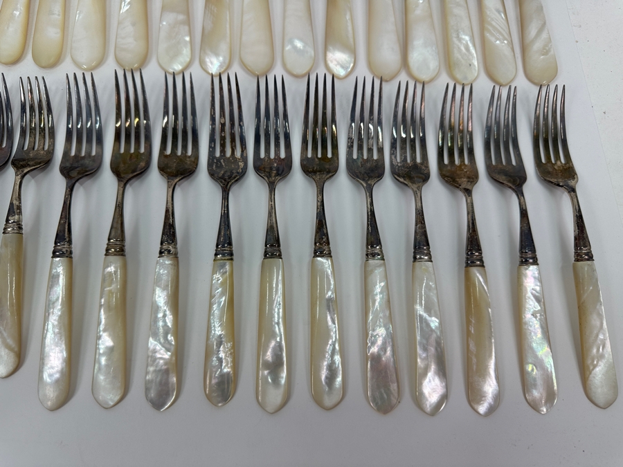 Atkinson Bros Sheffield England Flatware W/ Mother Of Pearl Handles & Sterling Silver Forks Marked With A Crown:(12) Dinner Knives, (11) Dinner Forks, (12) Small Knives, (11) Dessert Forks Approximate Silver Weight 748g Apx. Silver Melt Value $847 [Photo 2]