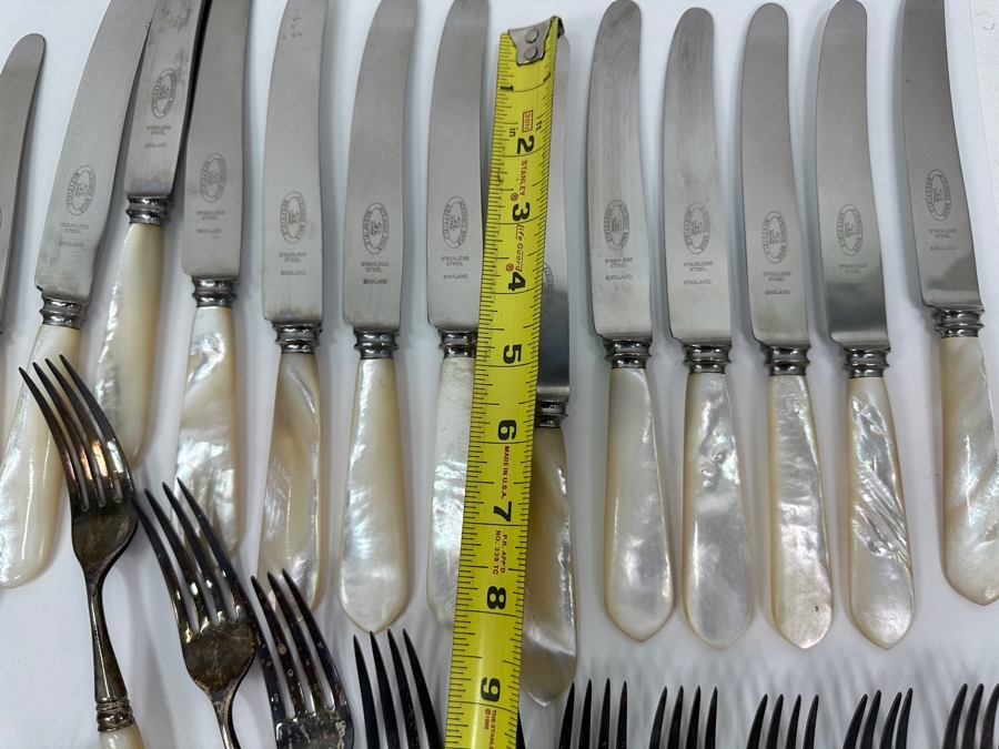 Atkinson Bros Sheffield England Flatware W/ Mother Of Pearl Handles & Sterling Silver Forks Marked With A Crown:(12) Dinner Knives, (11) Dinner Forks, (12) Small Knives, (11) Dessert Forks Approximate Silver Weight 748g Apx. Silver Melt Value $847 [Photo 17]
