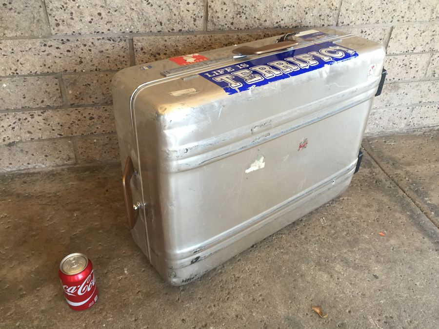 Vintage Aluminum Zero Halliburton Luggage On Casters - Missing One Caster [Photo 1]