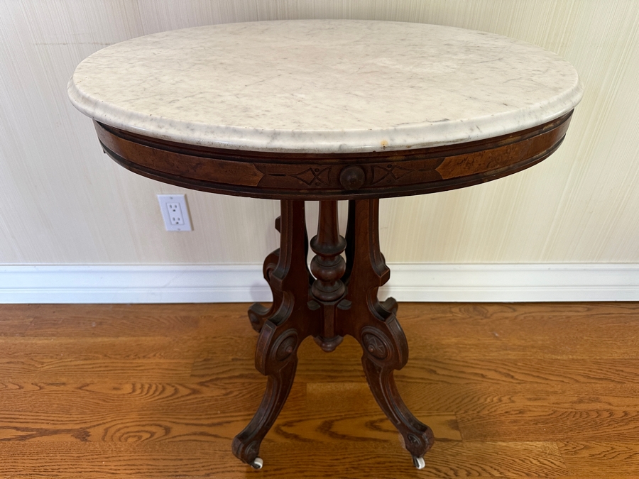 Antique Victorian Marble Top Carved Walnut Oval Parlor Table With Casters 28W X 22D X 31H [Photo 2]