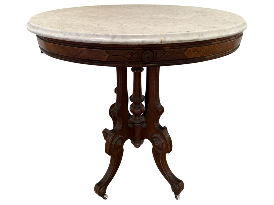 Antique Victorian Marble Top Carved Walnut Oval Parlor Table With Casters 28W X 22D X 31H [Photo 1]