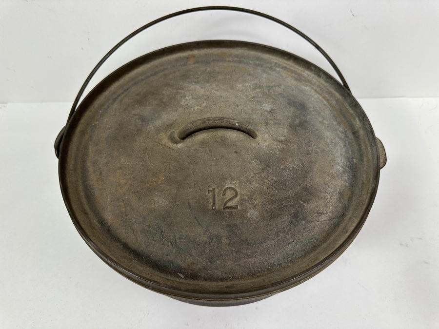 Lodge Cast Iron Camp Dutch Oven With Handle 3-Footed No. 12 14'W X 7'H [Photo 2]