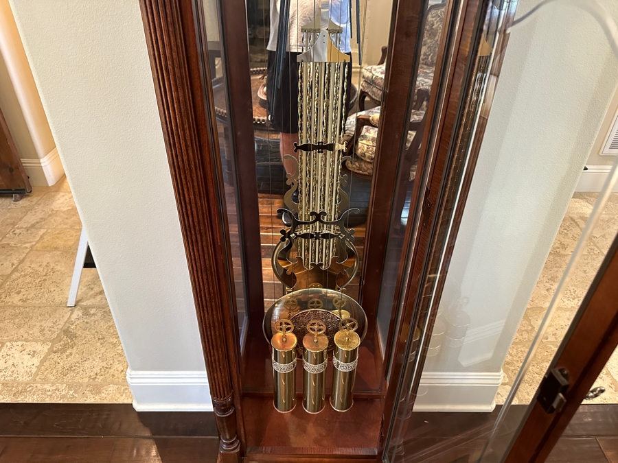 Howard Miller 71st Anniversary Edition 'The Rochester' Floor Clock in Windsor Cherry Case with Olive Ash Burls and Carved Overlay Shell Model #610-793 Serial #70240205 21'W x 12'D x 85'H [Photo 7]