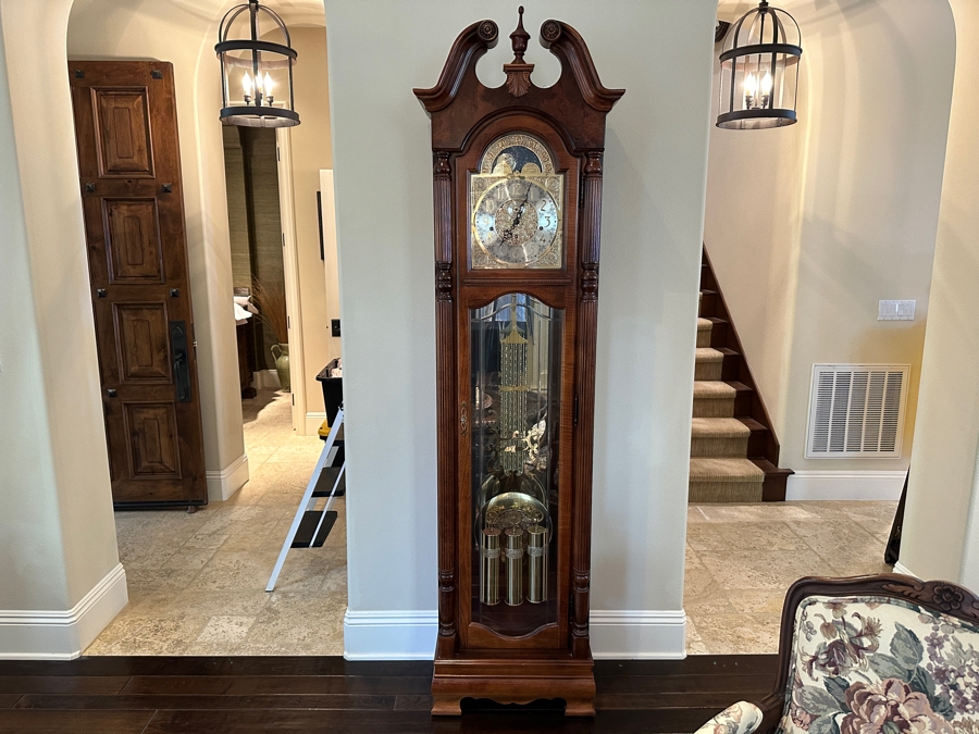 Howard Miller 71st Anniversary Edition 'The Rochester' Floor Clock in Windsor Cherry Case with Olive Ash Burls and Carved Overlay Shell Model #610-793 Serial #70240205 21'W x 12'D x 85'H