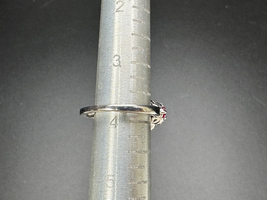 14k Gold Ring Set With Glass Filled Rubies (1) 7 X 5mm Oval Ruby, (2) 3.5mm Round Rubies & (2) 3.0mm Round Rubies Accented With (40) .5mm Round Brilliant Diamonds Est. .18cttw H-I, SI1-2 Size 4 3.9g Retails $1,300 [Photo 9]