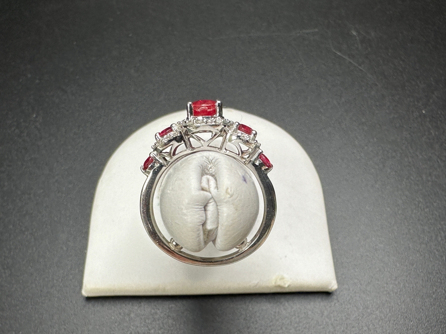 14k Gold Ring Set With Glass Filled Rubies (1) 7 X 5mm Oval Ruby, (2) 3.5mm Round Rubies & (2) 3.0mm Round Rubies Accented With (40) .5mm Round Brilliant Diamonds Est. .18cttw H-I, SI1-2 Size 4 3.9g Retails $1,300 [Photo 6]