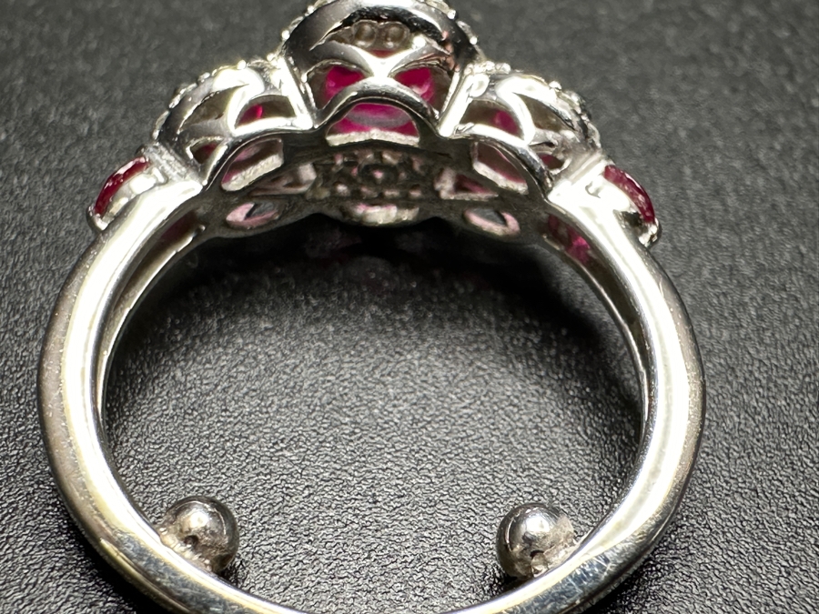 14k Gold Ring Set With Glass Filled Rubies (1) 7 X 5mm Oval Ruby, (2) 3.5mm Round Rubies & (2) 3.0mm Round Rubies Accented With (40) .5mm Round Brilliant Diamonds Est. .18cttw H-I, SI1-2 Size 4 3.9g Retails $1,300 [Photo 7]