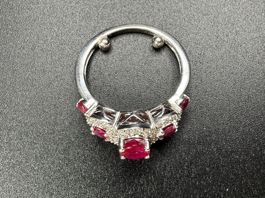 14k Gold Ring Set With Glass Filled Rubies (1) 7 X 5mm Oval Ruby, (2) 3.5mm Round Rubies & (2) 3.0mm Round Rubies Accented With (40) .5mm Round Brilliant Diamonds Est. .18cttw H-I, SI1-2 Size 4 3.9g Retails $1,300 [Photo 8]