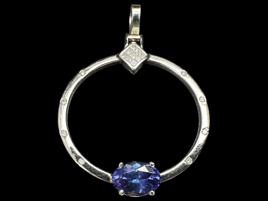 14k Gold Tanzanite Diamond Pendant Set With A 9x6 Oval Tanzanite Est. 1.50ct, (8) 1mm Round Brilliant Diamonds & (9) 1mm Princess Cut Diamonds - Diamonds Est. .15cttw 5.1g Retails $3,000