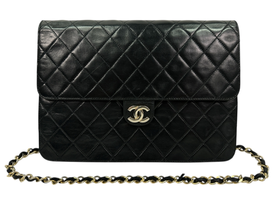 Vintage Chanel Classic Handbag In Lambskin Leather With Gold-Tone Metal Chain Straight Flap Estimate $3,800