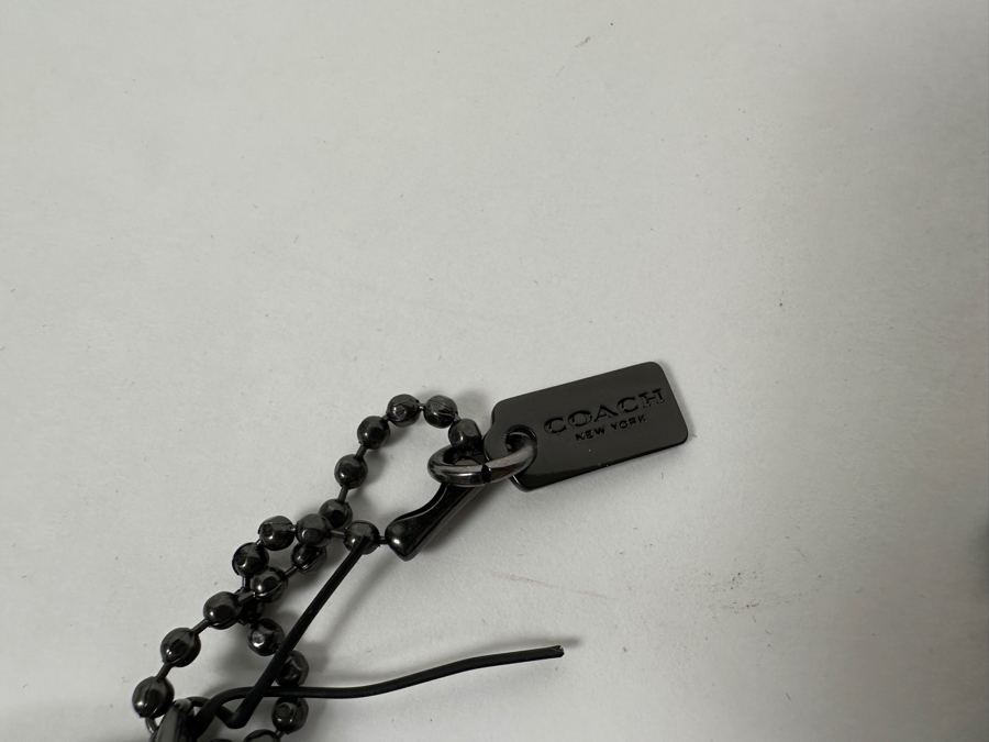 Pair Of Disney x Coach Mickey Mouse Leather Hangtag Bag Charm And Mickey Mouse Thumbs Up Tag Charm By Coach Handbags [Photo 4]