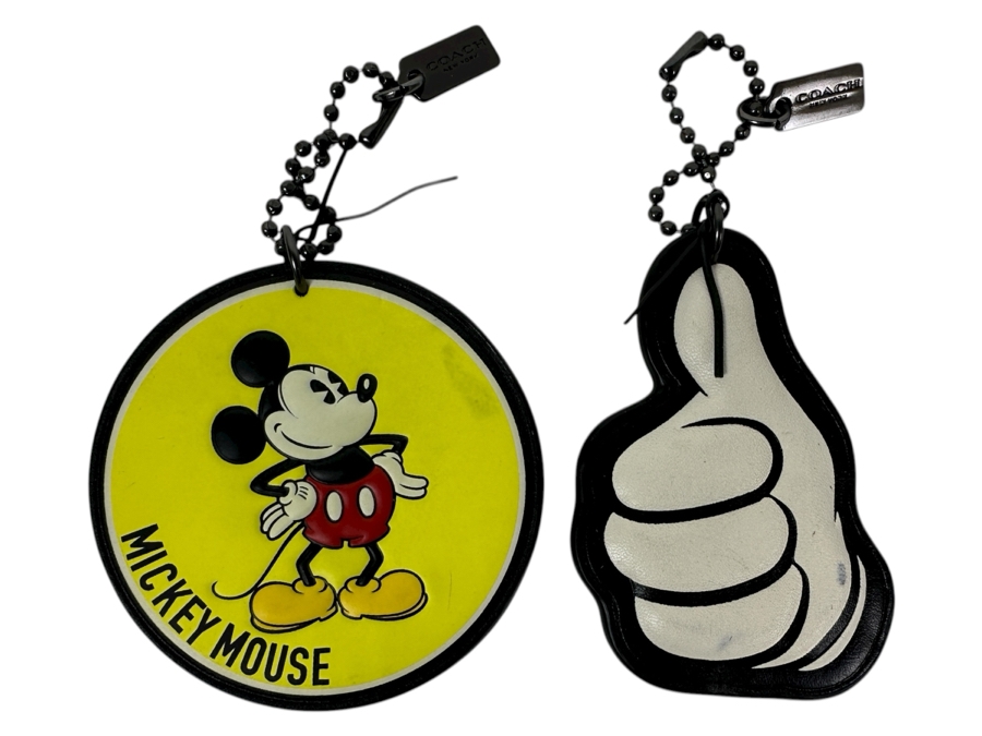 Pair Of Disney x Coach Mickey Mouse Leather Hangtag Bag Charm And Mickey Mouse Thumbs Up Tag Charm By Coach Handbags