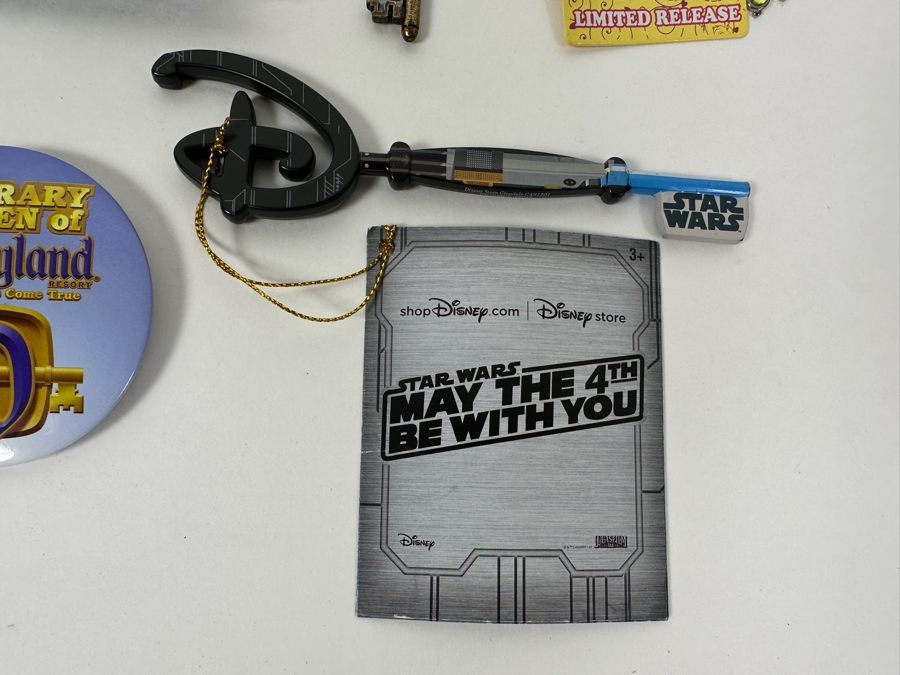 Collection Of Disneyland Collectibles Including Magic Key Trading Pin, Limited Edition Tinker Bell Trading Pin, Button, Disneyland Haunted Mansion Key And Star Wars May The 4th Be With You Key [Photo 7]