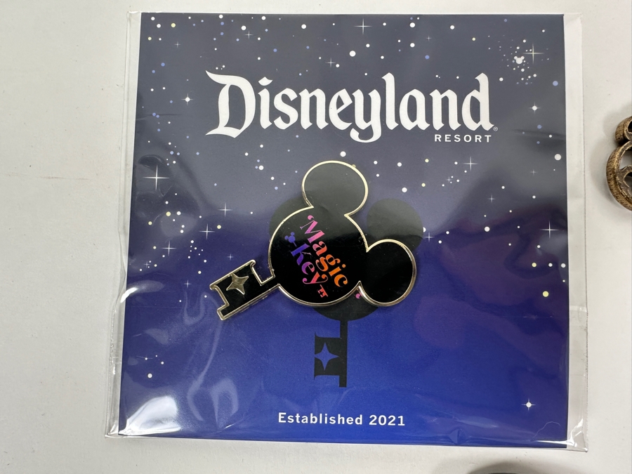 Collection Of Disneyland Collectibles Including Magic Key Trading Pin, Limited Edition Tinker Bell Trading Pin, Button, Disneyland Haunted Mansion Key And Star Wars May The 4th Be With You Key [Photo 2]
