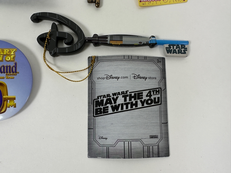 Collection Of Disneyland Collectibles Including Magic Key Trading Pin, Limited Edition Tinker Bell Trading Pin, Button, Disneyland Haunted Mansion Key And Star Wars May The 4th Be With You Key [Photo 8]