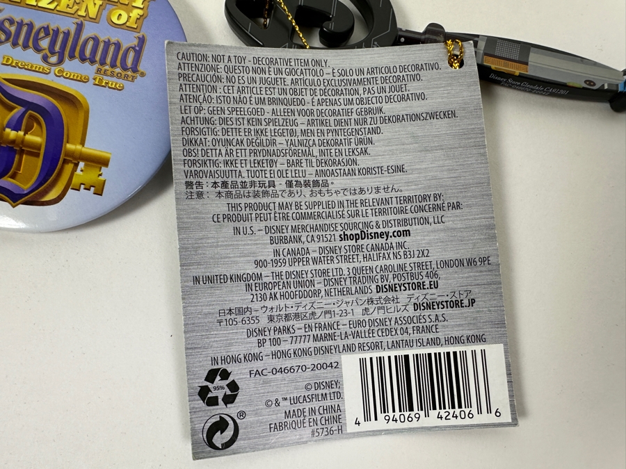 Collection Of Disneyland Collectibles Including Magic Key Trading Pin, Limited Edition Tinker Bell Trading Pin, Button, Disneyland Haunted Mansion Key And Star Wars May The 4th Be With You Key [Photo 9]