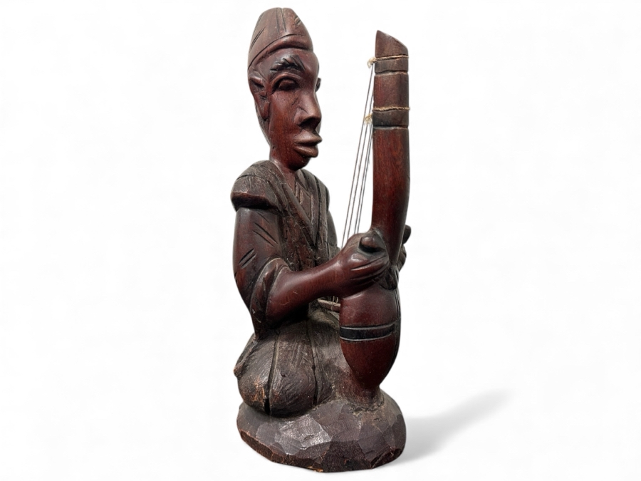 Carved Wooden African Sculpture Of A Musician Playing A Stringed Instrument 10.5'H