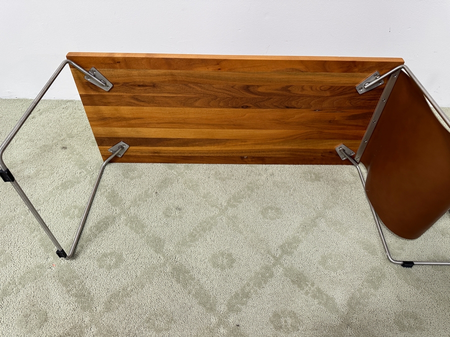 DWR Index Table with Integrated Magazine Holder Solid Walnut Tabletop, Stainless Frame and Leather Pouch 45.5'W x 16'D x 16'H Retail $895 [Photo 4]