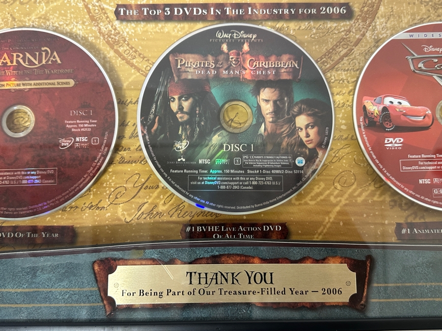 Buena Vista Home Entertainment Limited Edition Commemorative Numbered 123/500 With Dvds Of Disney Pixar Cars, Walt Disney's Pirates Of The Caribbean, The Chronicles Of Narnia, The Little Mermaid, High School Musical, Lost & Grey's Anatomy 18.5 X 19.5 [Photo 2]