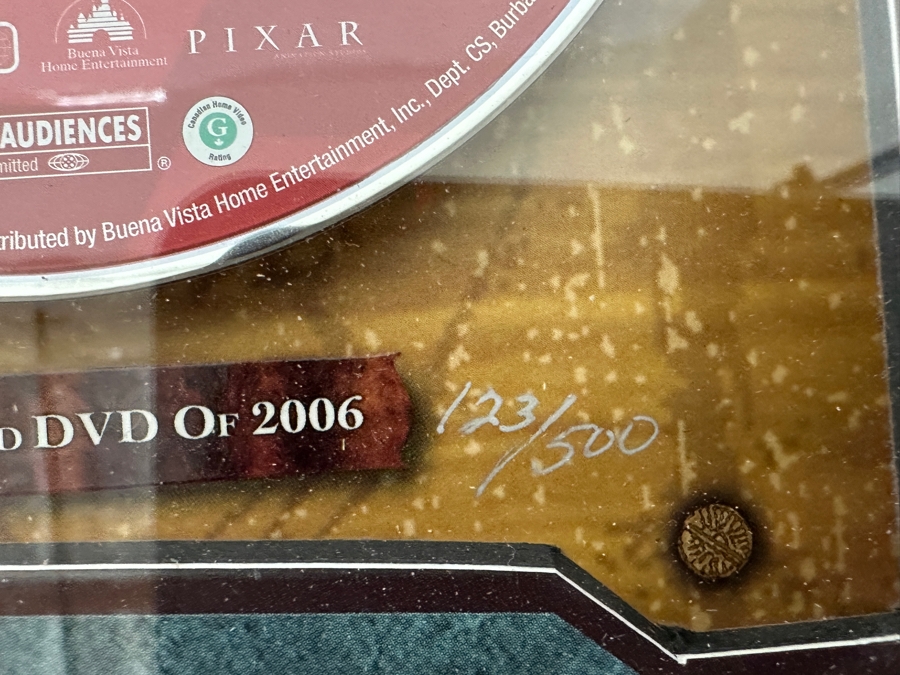 Buena Vista Home Entertainment Limited Edition Commemorative Numbered 123/500 With Dvds Of Disney Pixar Cars, Walt Disney's Pirates Of The Caribbean, The Chronicles Of Narnia, The Little Mermaid, High School Musical, Lost & Grey's Anatomy 18.5 X 19.5 [Photo 3]