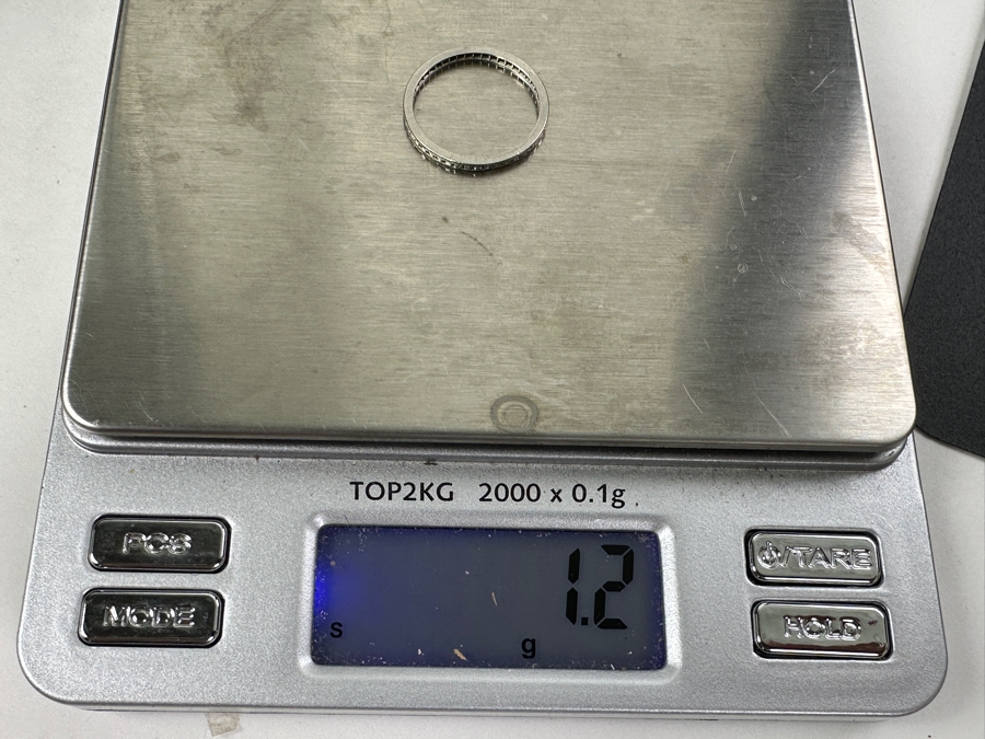 Small Platinum Diamond Ring Set With (42) .5mm Round Diamonds Est. .20cttw 1.2g Estimate $500 [Photo 4]