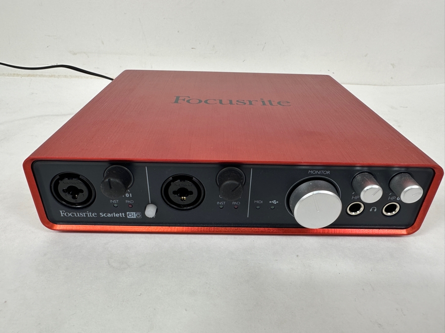 Focusrite Scarlett 6i6 Audio Interface: A Compact Red Unit For Music Production, Featuring XLR Inputs, Headphone Outputs, And MIDI Connectivity [Photo 2]