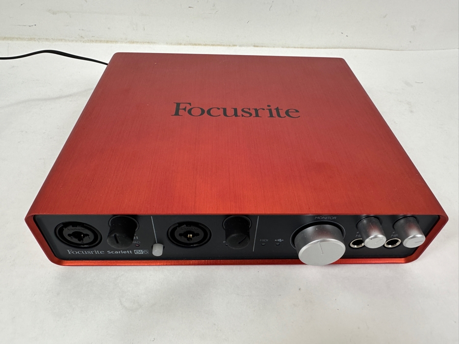 Focusrite Scarlett 6i6 Audio Interface: A Compact Red Unit For Music Production, Featuring XLR Inputs, Headphone Outputs, And MIDI Connectivity [Photo 4]