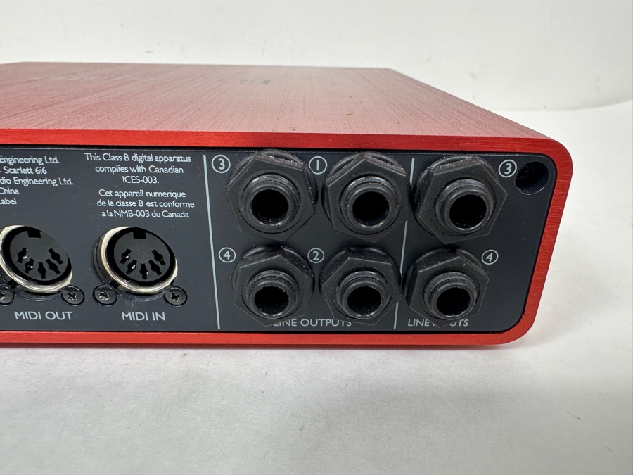 Focusrite Scarlett 6i6 Audio Interface: A Compact Red Unit For Music Production, Featuring XLR Inputs, Headphone Outputs, And MIDI Connectivity [Photo 8]