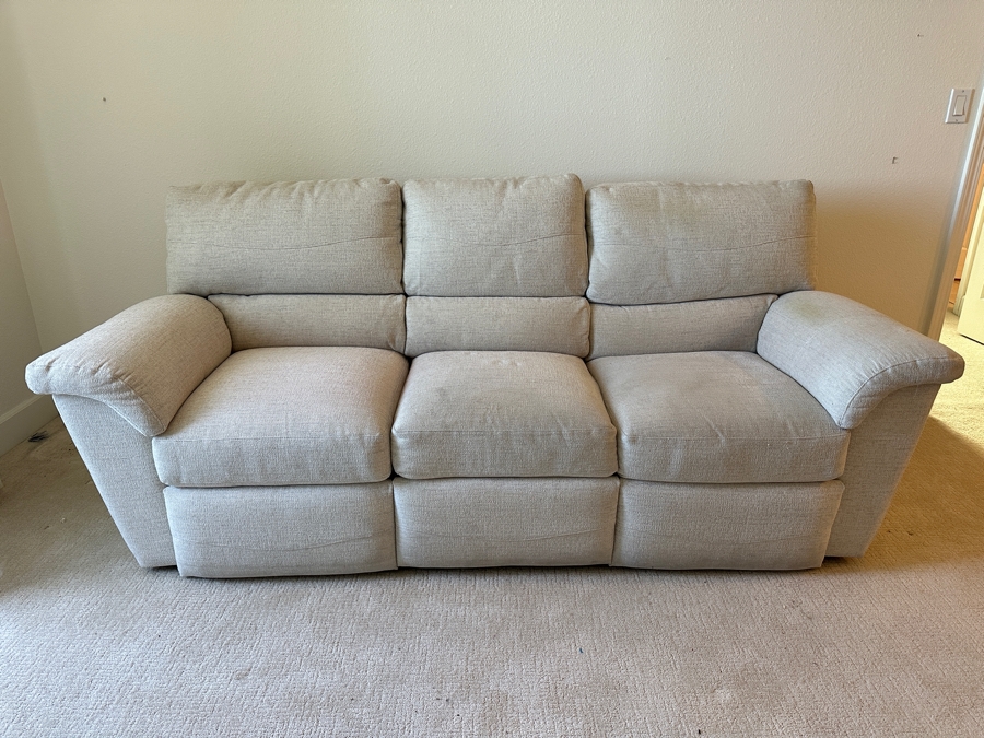 La-Z-Boy Reclining Sofa With Plush Cushions And A Light Beige Fabric 90'W X 36'D X 38'H [Photo 4]