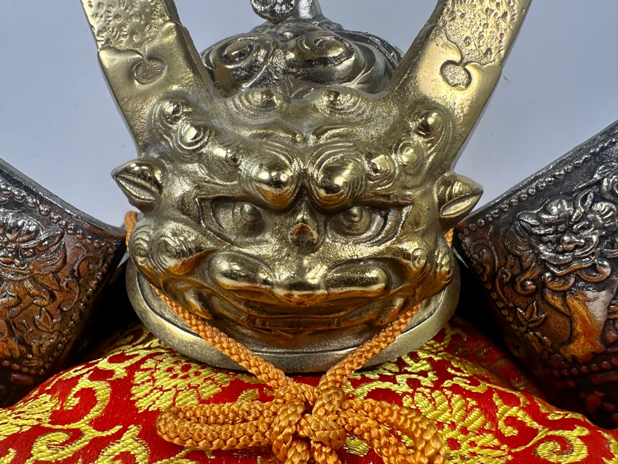 Reproduction Ornate Golden Samurai Helmet On Red Brocade Pillow With Tassels 12.5'W x 12'H [Photo 2]