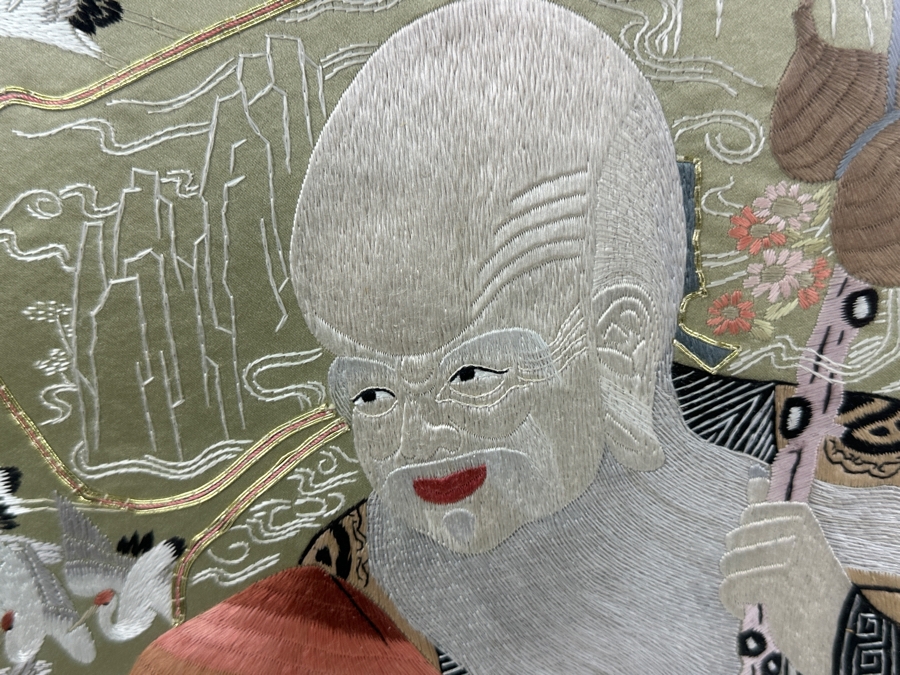 Framed Embroidered Silk Panel Depicting Taoist Immortal ShouXing Surrounded by Cranes 23.5'W x 32'H [Photo 5]