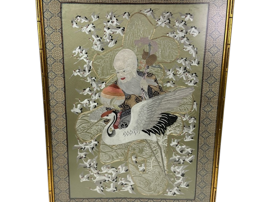 Framed Embroidered Silk Panel Depicting Taoist Immortal ShouXing Surrounded by Cranes 23.5'W x 32'H
