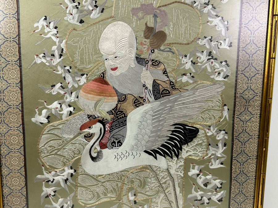 Framed Embroidered Silk Panel Depicting Taoist Immortal ShouXing Surrounded by Cranes 23.5'W x 32'H [Photo 9]