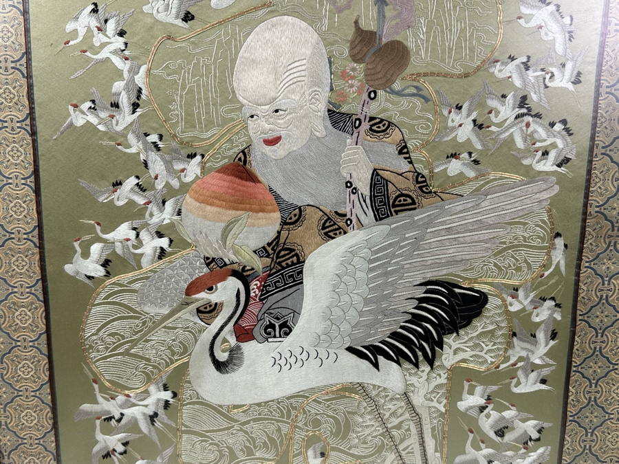 Framed Embroidered Silk Panel Depicting Taoist Immortal ShouXing Surrounded by Cranes 23.5'W x 32'H [Photo 4]