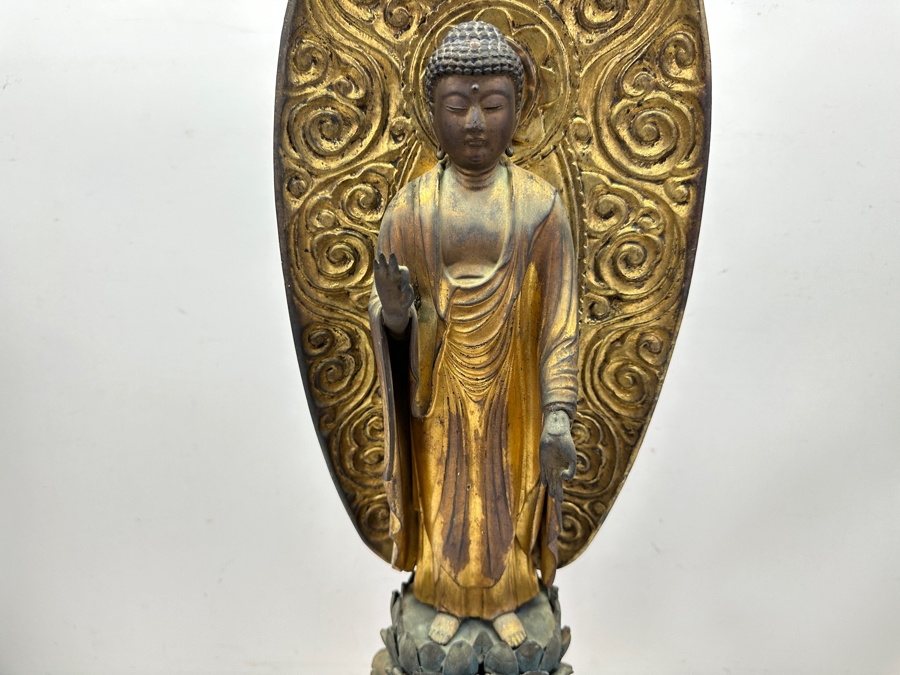 Antique Japanese Edo Period (1603-1868) Carved Gilt Wooden Sculpture Of Amida Buddha Standing On A Lotus Base With Halo Mandorla Behind The Figure 25.5'H Estimate $3,000-$6,000 [Photo 21]
