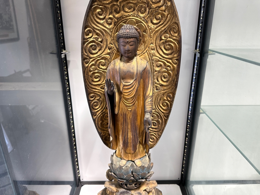Antique Japanese Edo Period (1603-1868) Carved Gilt Wooden Sculpture Of Amida Buddha Standing On A Lotus Base With Halo Mandorla Behind The Figure 25.5'H Estimate $3,000-$6,000 [Photo 3]