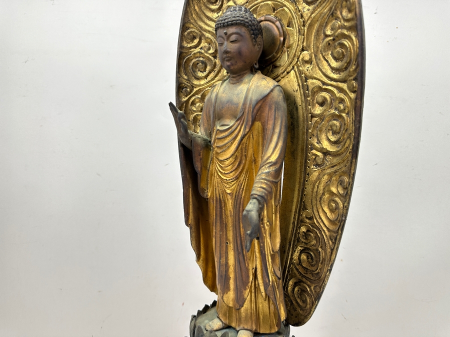 Antique Japanese Edo Period (1603-1868) Carved Gilt Wooden Sculpture Of Amida Buddha Standing On A Lotus Base With Halo Mandorla Behind The Figure 25.5'H Estimate $3,000-$6,000 [Photo 12]