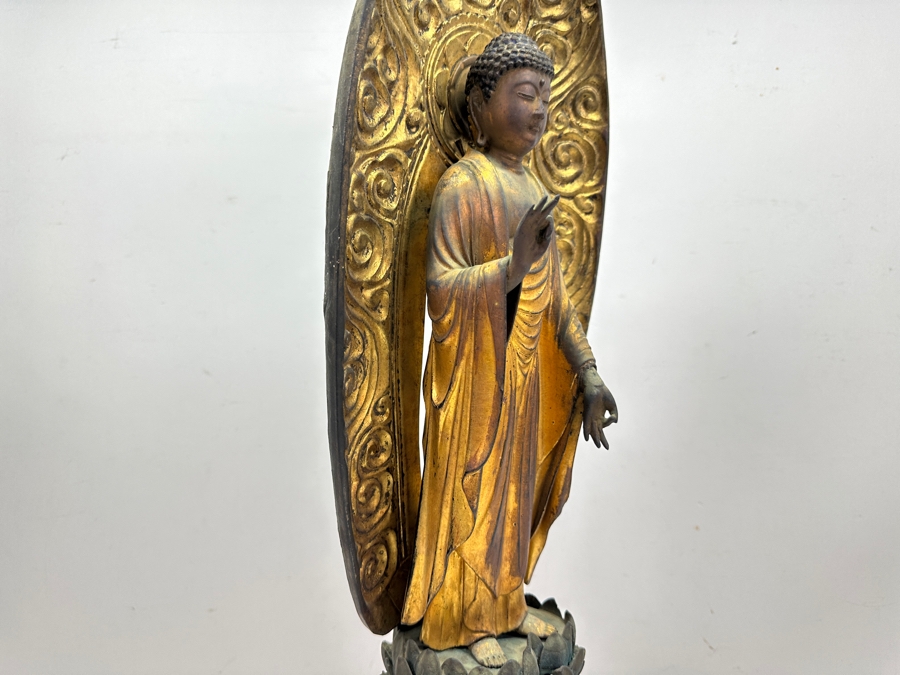 Antique Japanese Edo Period (1603-1868) Carved Gilt Wooden Sculpture Of Amida Buddha Standing On A Lotus Base With Halo Mandorla Behind The Figure 25.5'H Estimate $3,000-$6,000 [Photo 9]